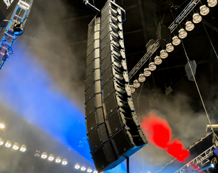 L-Acoustics K Series line array loudspeakers suspended for professional concert sound reinforcement